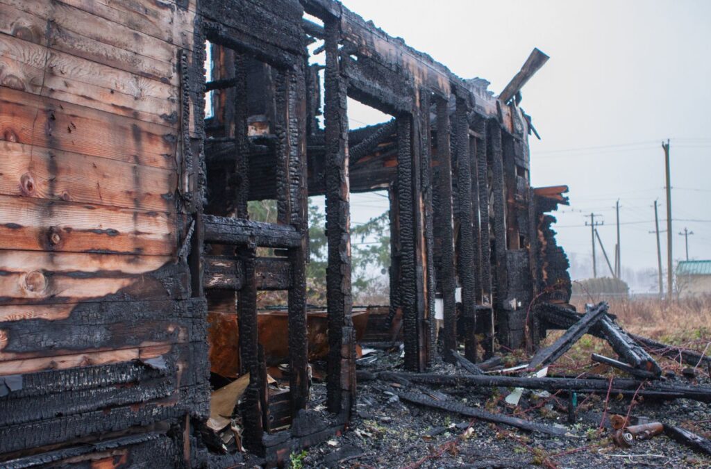 Edge Restoration expert evaluating fire damage in a Little Valley, UT home, highlighting the benefits of our comprehensive services.